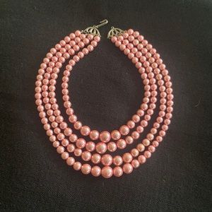 Vintage 4 strand pink beaded necklace with deco like clasp.